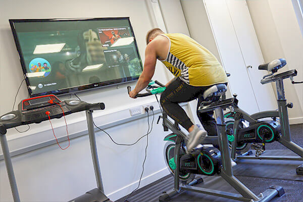 employee on a exercise bike